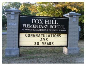 Fox Hill sign that says "Congratulations AYS 30 Years"